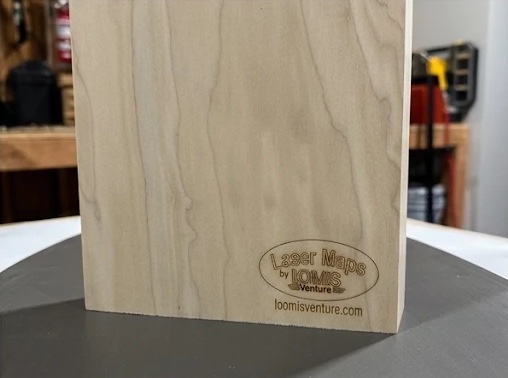 The back, engraved Laser Maps by Loomis Venture and loomisventure.com